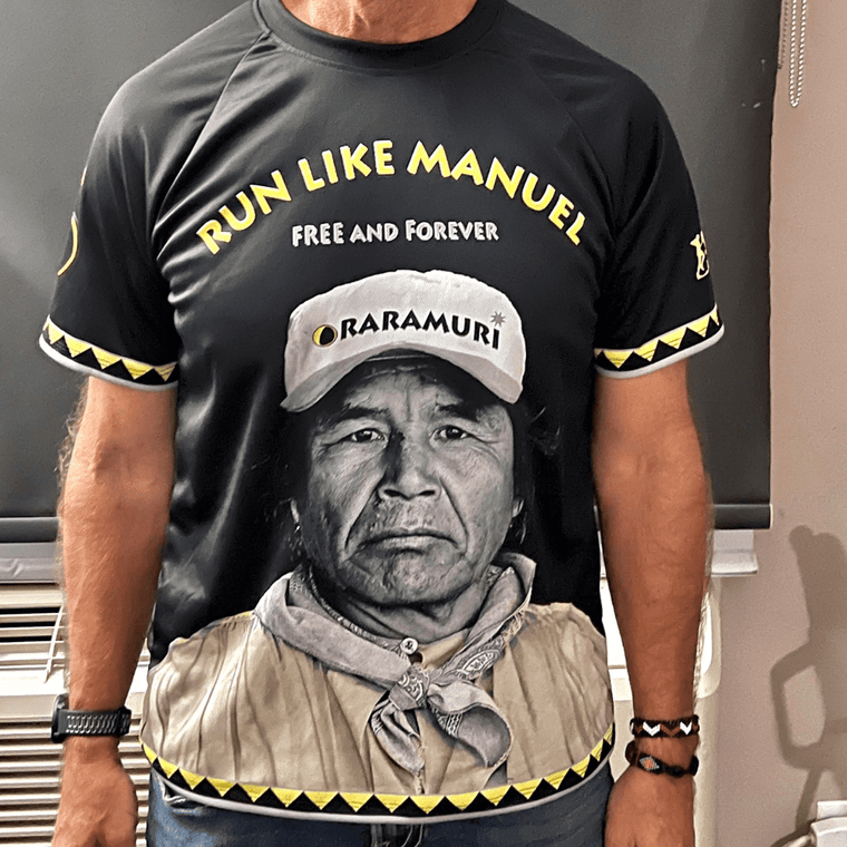 "RUN LIKE MANUEL" SHIRT - TRUE MESSAGES DONATION - front, worn