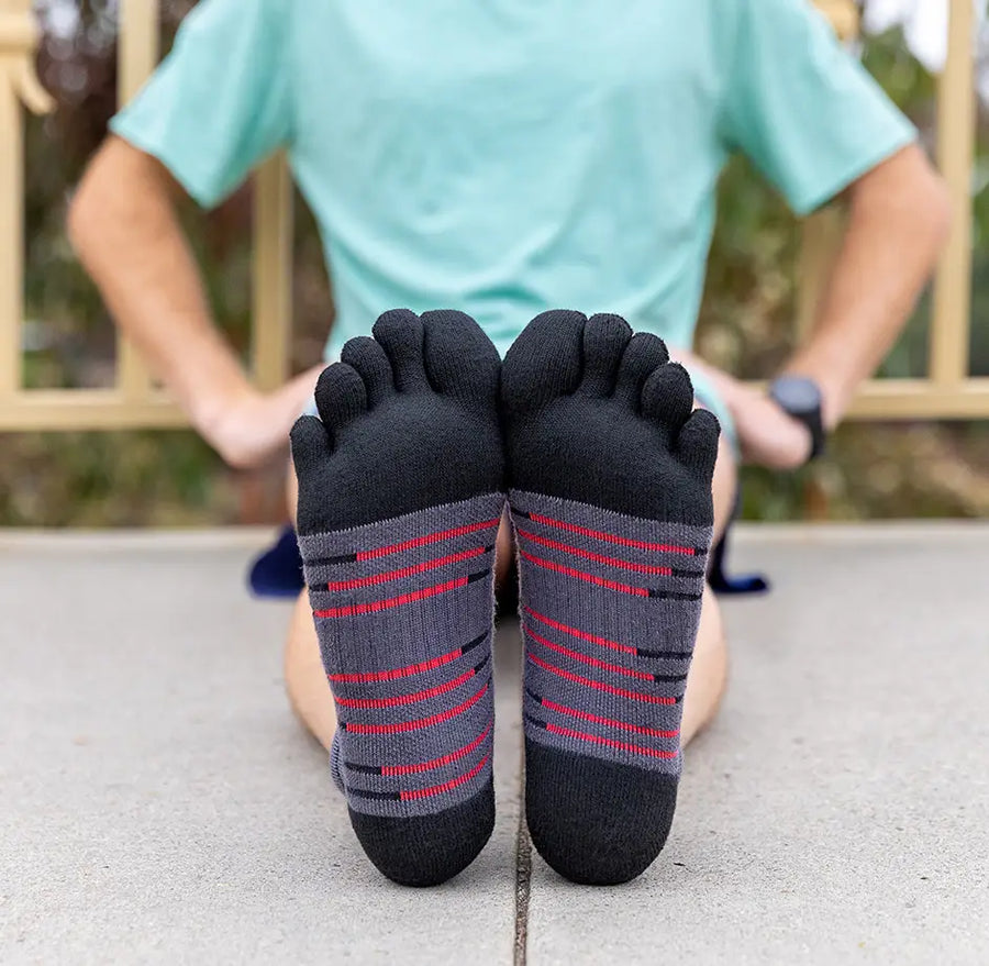 Injinji Toe Socks - Ultra Run Mini Crew - Onyx - soles up, seated