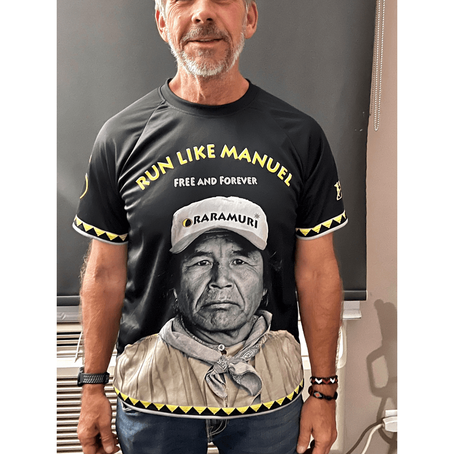"RUN LIKE MANUEL" SHIRT - TRUE MESSAGES DONATION - front, worn - portrait