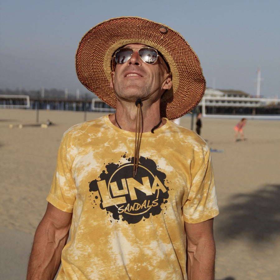"RUN FREE" LUNA SPLASH TIE-DYE TEE T-SHIRT - worn at the beach, front
